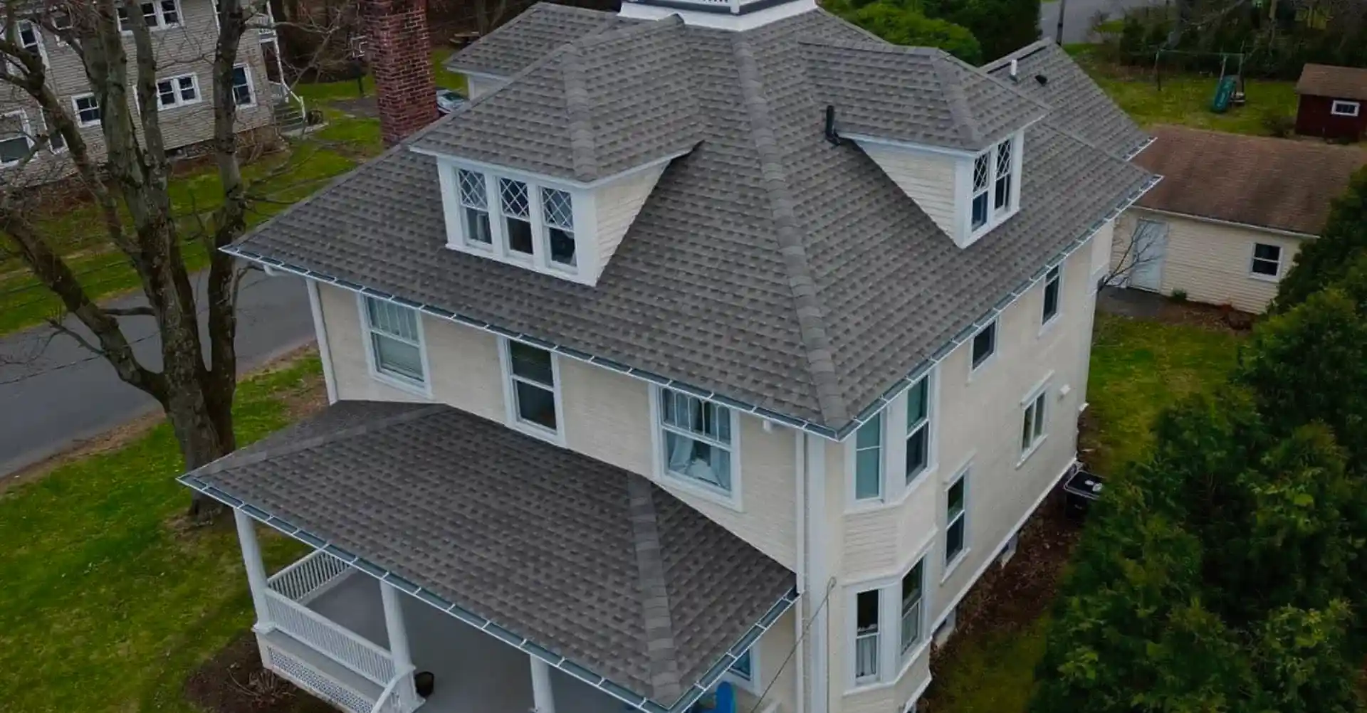 Residential home exterior with newly installed roof