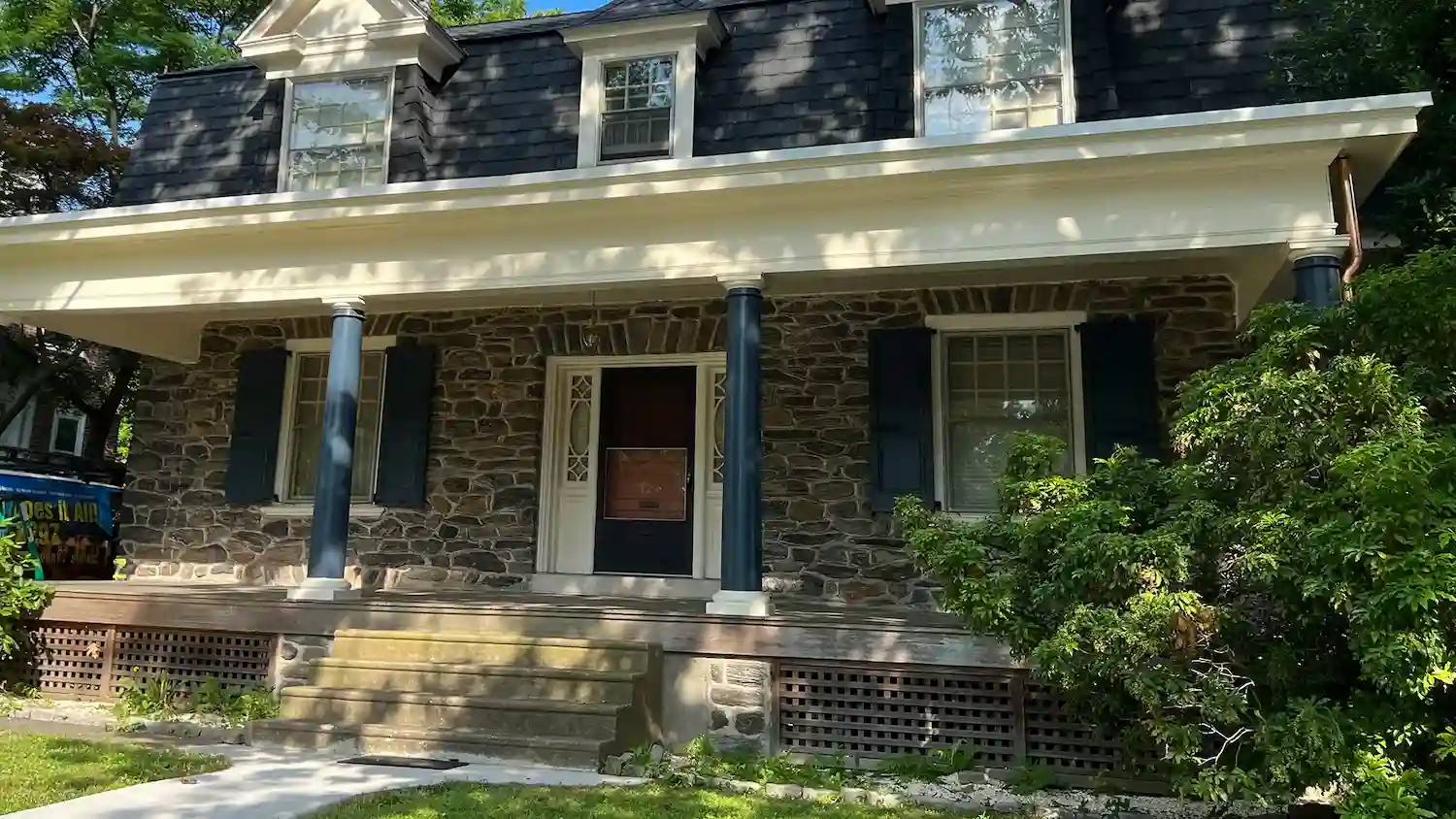 Residential stone masonry front porch and columns installation
